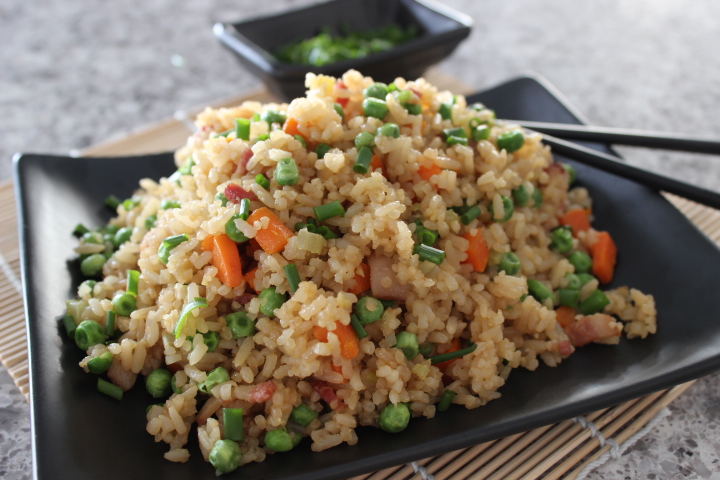 Looking for a quick and delicious meal? Try our Chicken Chopper Rice  recipe! Cooked in a savory sauce, served over fluffy rice with a half-fry  egg. Garnished with spring onions for extra